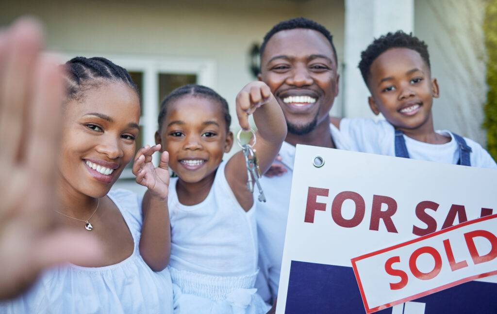 Photo of family in their new home